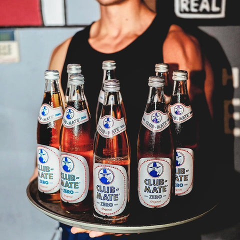 many bottles of club mate zero on a platter