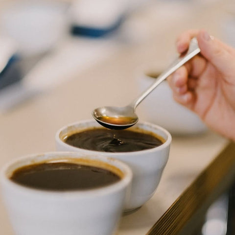 250g of Cafetiere coffee rosated in London by Monmouth brewed coffee in a cup