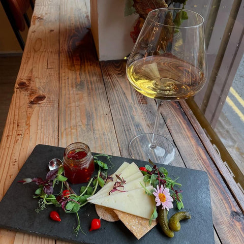 one glass of solara orange wine, romania with food