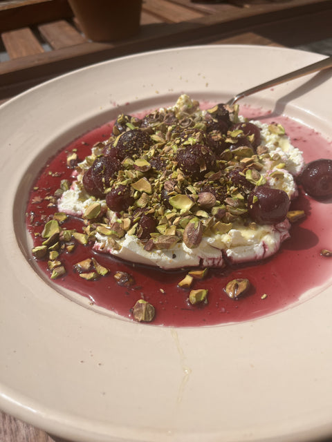 Fennel and Fig Leaf Cherries with Labneh, Honey, and Toasted Pistachios