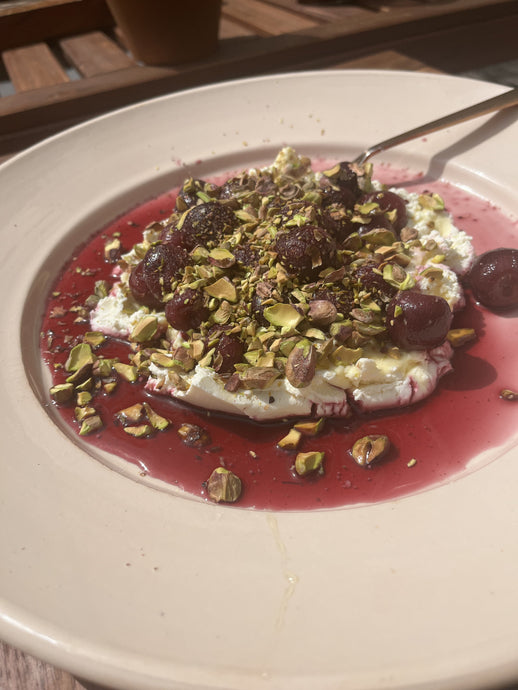 FENNEL AND FIG LEAF CHERRIES, WITH LABNEH, HONEY & TOASTED PISTACHIOS.