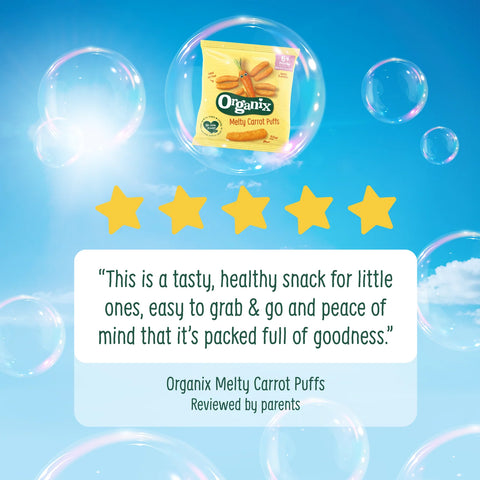 Organix Melty Carrot Puffs snack package floating inside a large bubble on a bright blue background with floating bubbles, five yellow stars, and a quote box that reads, 'This is a tasty, healthy snack for little ones, easy to grab & go and peace of mind that it's packed full of goodness.'.