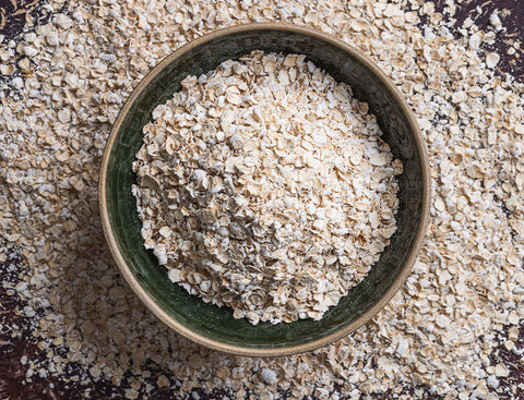 Bowl of oatmeal on a textured surface