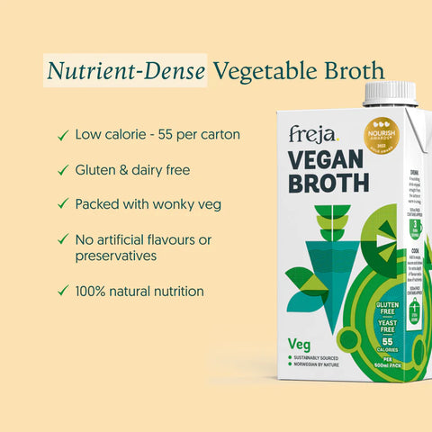 A carton of Freja Vegan Broth shown on a warm beige background with marketing text listing benefits like low calorie, gluten & dairy free, and packed with wonky veg.