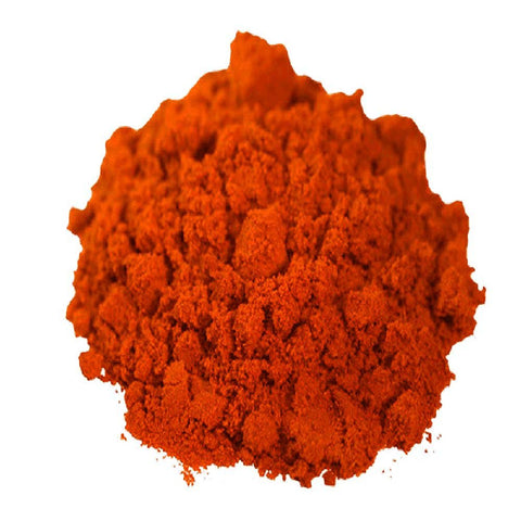 pile of ground chilli powder on white background