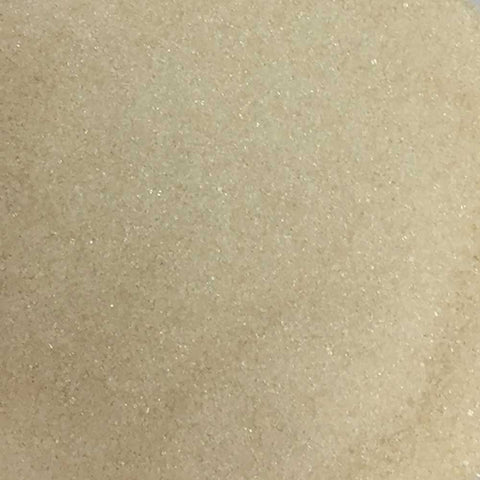 A close-up of organic extra light granulated sugar
