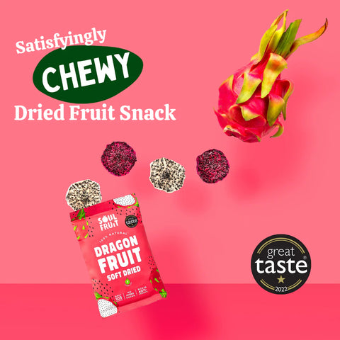 Soul Fruit Chewy Dried Fruit Snack in Dragon Fruit flavor, shown with its red packaging, three floating dried fruit pieces, a dragon fruit illustration, and award badges on a pink background.