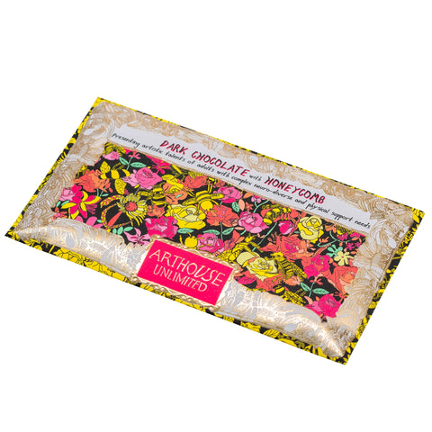 Floral packaging of Arthouse Unlimited dark chocolate with honeycomb on a white background