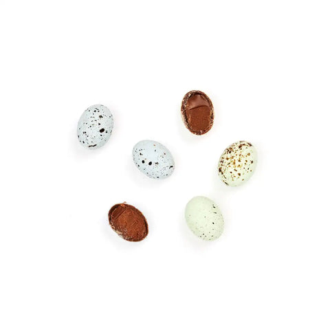 selection of turtle dove chocolate eggs showing what's inside