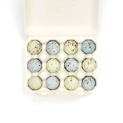 Open box of chocolate detective eggs