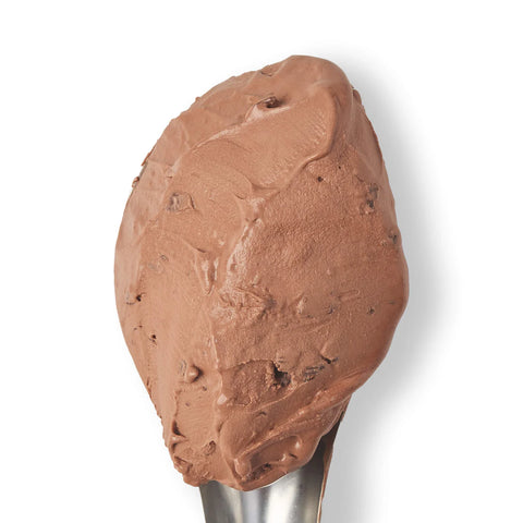 A scoop double chocolate ice cream on a metallic spoon against a plain white background.