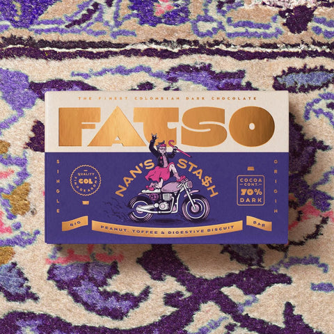 FATSO chocolate bar packaging on a patterned fabric background