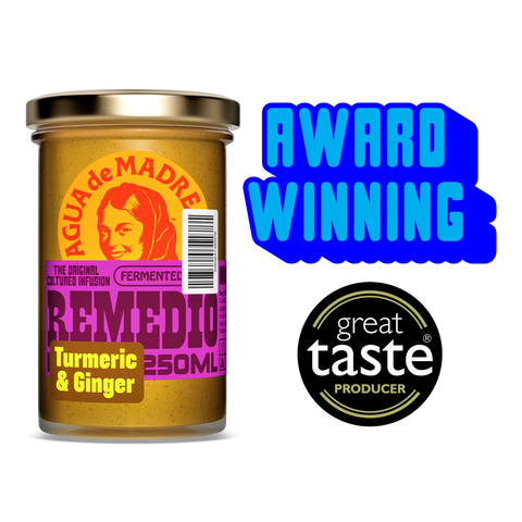 Jar of Agua de Madre Remedio with Turmeric & Ginger flavor, featuring 'Award Winning' and 'Great Taste Producer' labels.
