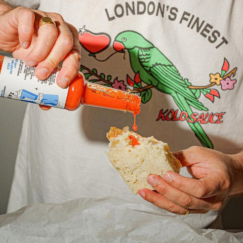 kold sauce poured on a sandwich 