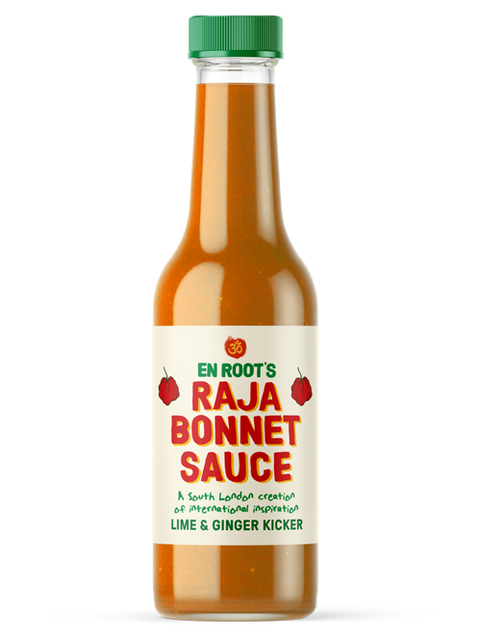 bottle of En Root's Raja Bonnet Sauce on white background