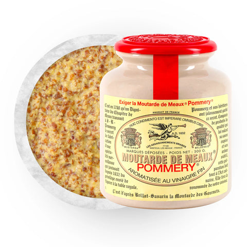 Jar of Moutarde de Meaux Pommery mustard with a red lid on a white background