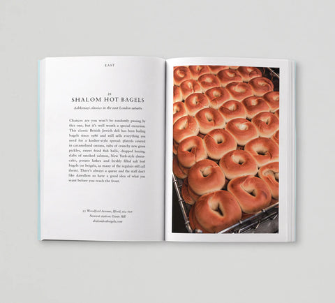 Open book showing a page with text and an image of hot bagels.