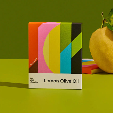 Ocelto lemon chocolate bar on green background with lemon