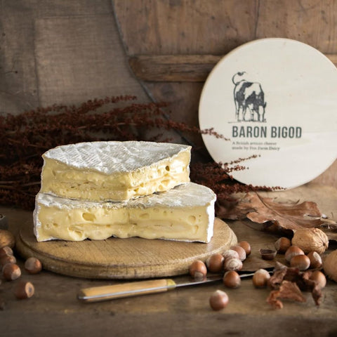 baron bigod brie cheese on a cutting board 