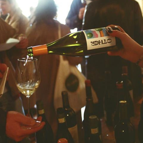 one bottle of jumi-juma 750ml being poured in a glass 