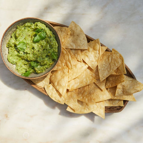 cool chile corn totopos Tortilla Chips 500g on a dish with guacamole 