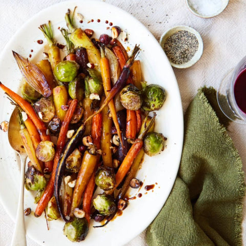 Bottle of Seggiano Organic Super Dense Balsamic Glaze 250 ml poured on grilled vegtables