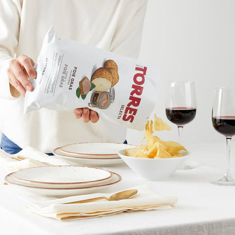 torres iberico ham potato crisps 150g premium potato crisps with rich iberico ham flavour poured in a bowl