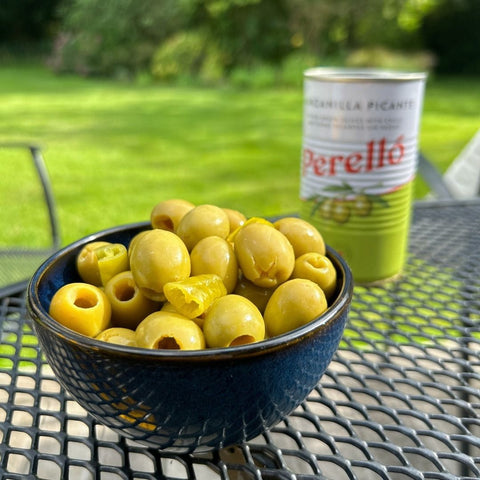 perello cocktail picante olives in a cup