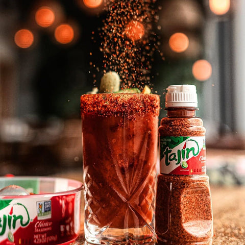 tajin chili lime seasoning on a glass 