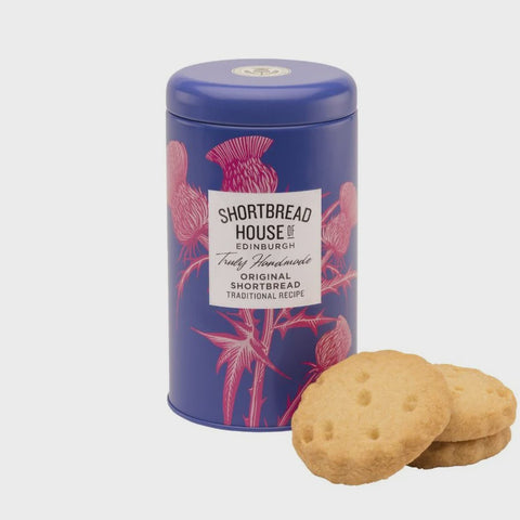 Tin of shortbread with 3 biscuits stacked in front