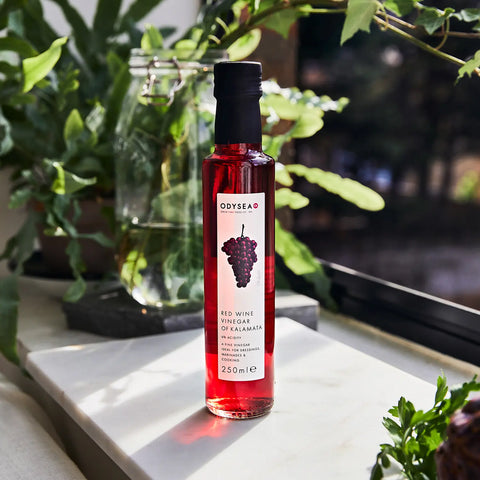bottle of vinegar surrounded by nature