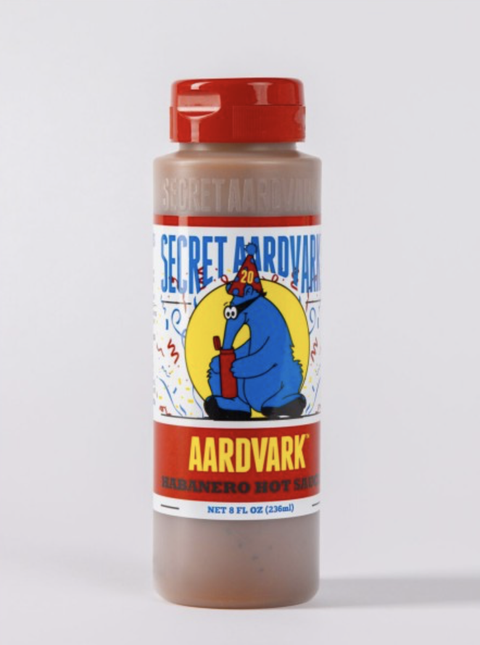 secret aardvark habanero hot sauce bottle with bold habanero heat, garlic, tomatoes, and spices. vegan, gluten-free, and full-flavour sauce