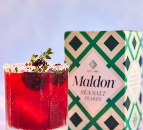 red drink infront of box of sea salt flakes