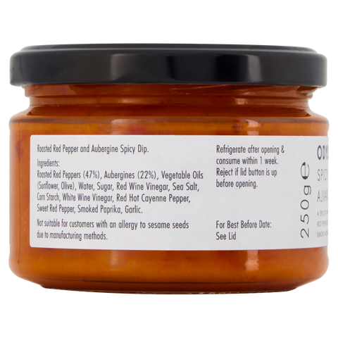 jar of spicy ajvar on white background