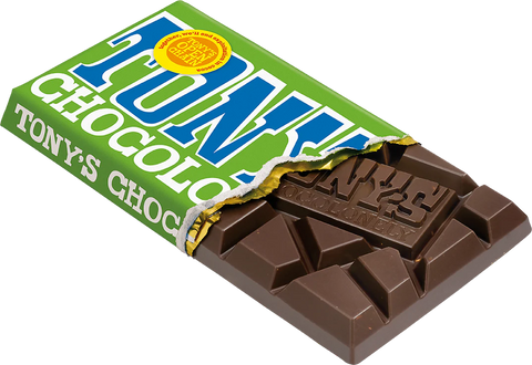 A Tony's Chocoloso chocolate bar with its green wrapper partially peeled back, showing the dark brown chocolate pieces. The wrapper features bold blue and white lettering with a yellow circular seal.