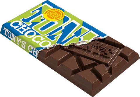 A partially unwrapped Tony's Choco chocolate bar, showing the dark brown chocolate pieces and the green and blue wrapper with the brand name 'TONY'S CHOCOLATE'.