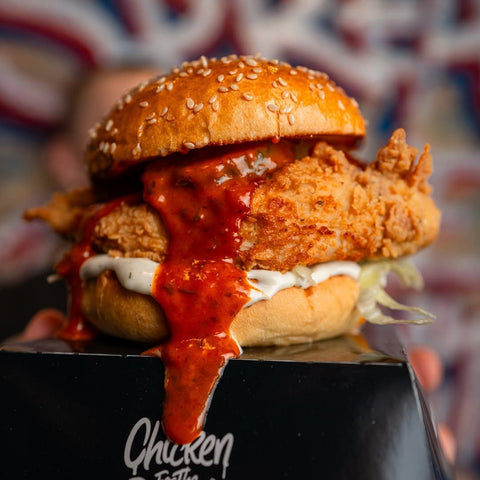 holy fuck hot sauce on sandwich