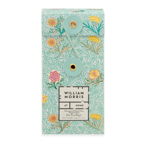 William Morris At Home tea bag box featuring a mint green and white floral pattern with yellow and pink flowers, gold button closures, and a central white label.