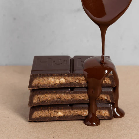 chocolate bar with melted chocolate drizzled on