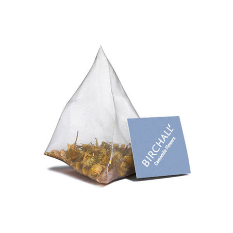 Tea bag with cannabis flowers and a 'Birchall' label on a white background