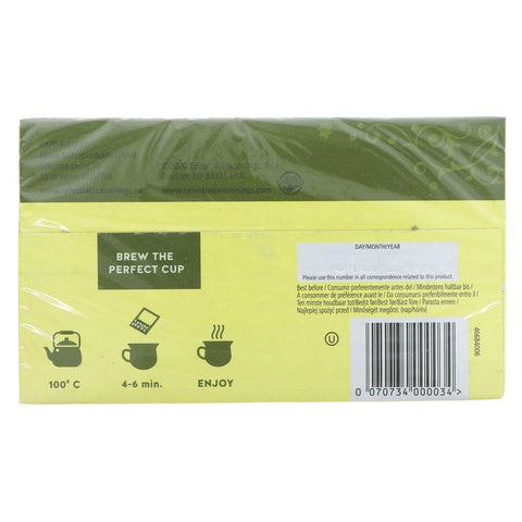 Tea package with green and yellow design on a white background
