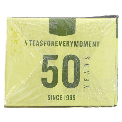 Packaged tea set with '50 years since 1969' text on a white background