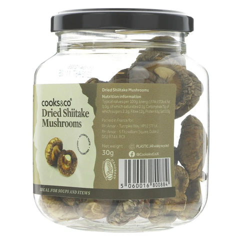 Jar of dried shiitake mushrooms with a label on a white background