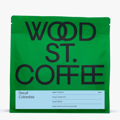 Green package of Wood St. Coffee with black text on a white background
