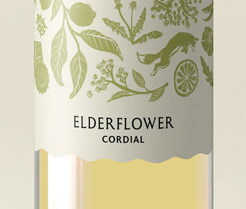 Elderflower cordial packaging with botanical design on a beige background