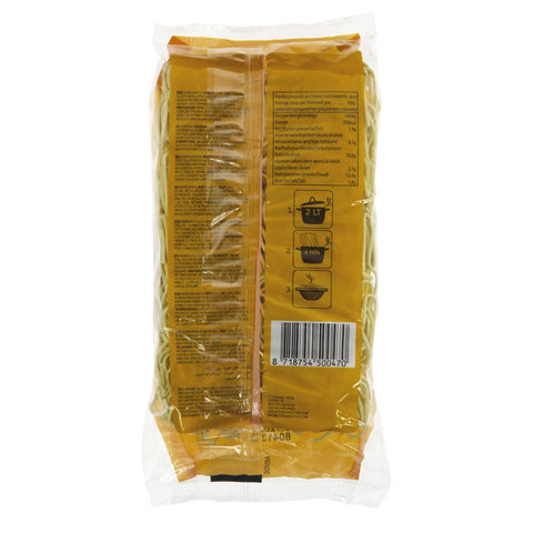 A package of dried pasta, shown from the back, featuring a yellow label with cooking instructions, a barcode, and a clear plastic wrapper on a white background.