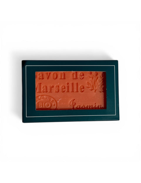 bar of soap in box on white background