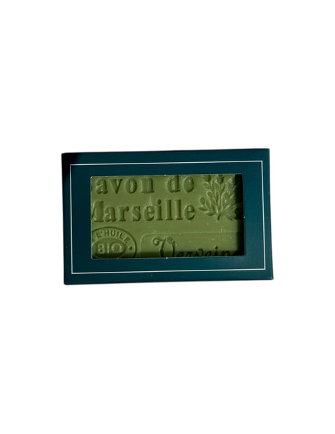 bar of soap in box on white background