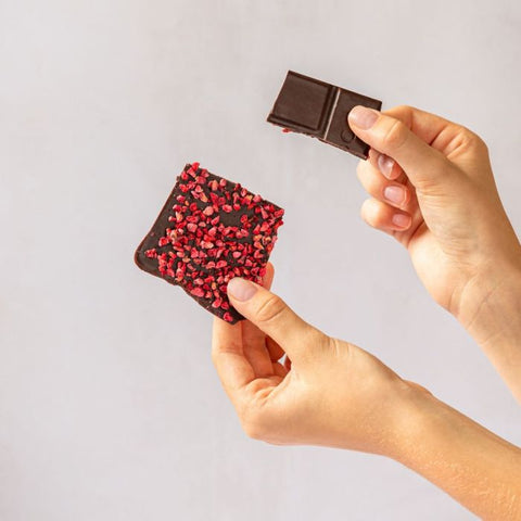 hands holding chocolate