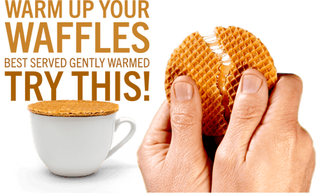 A person's hands holding a waffle that is split open to reveal melted cheese inside, with a white coffee cup on a saucer in the lower left and large orange text on a green background reading 'WARM UP YOUR WAFFLES BEST SERVED GENTLY WARMED TRY THIS!'.